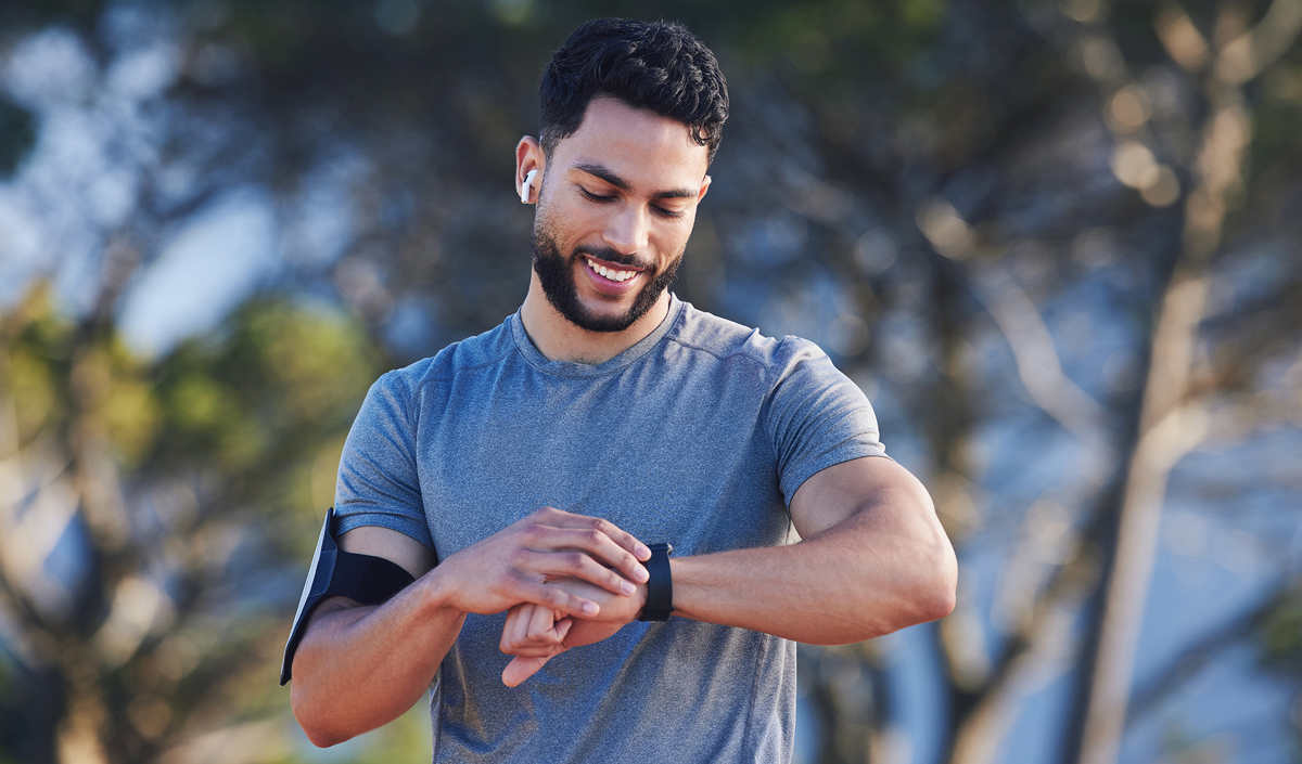 Runner outside, tracking health with Apple watch
