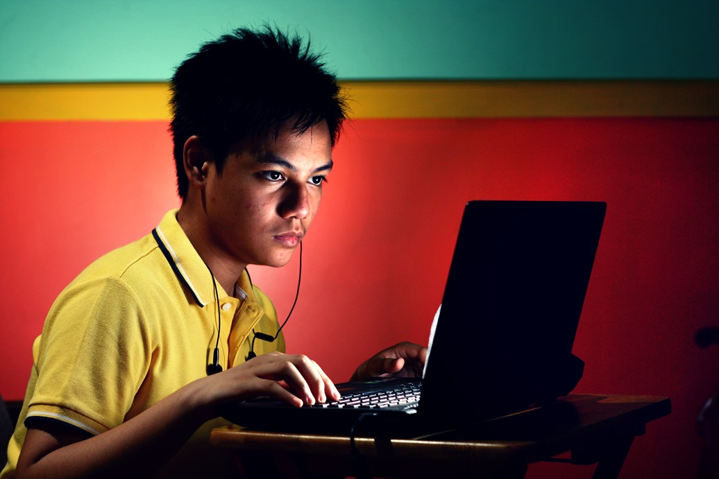 young asian teen with a laptop computer 2023 11 27 05 16 49 utc