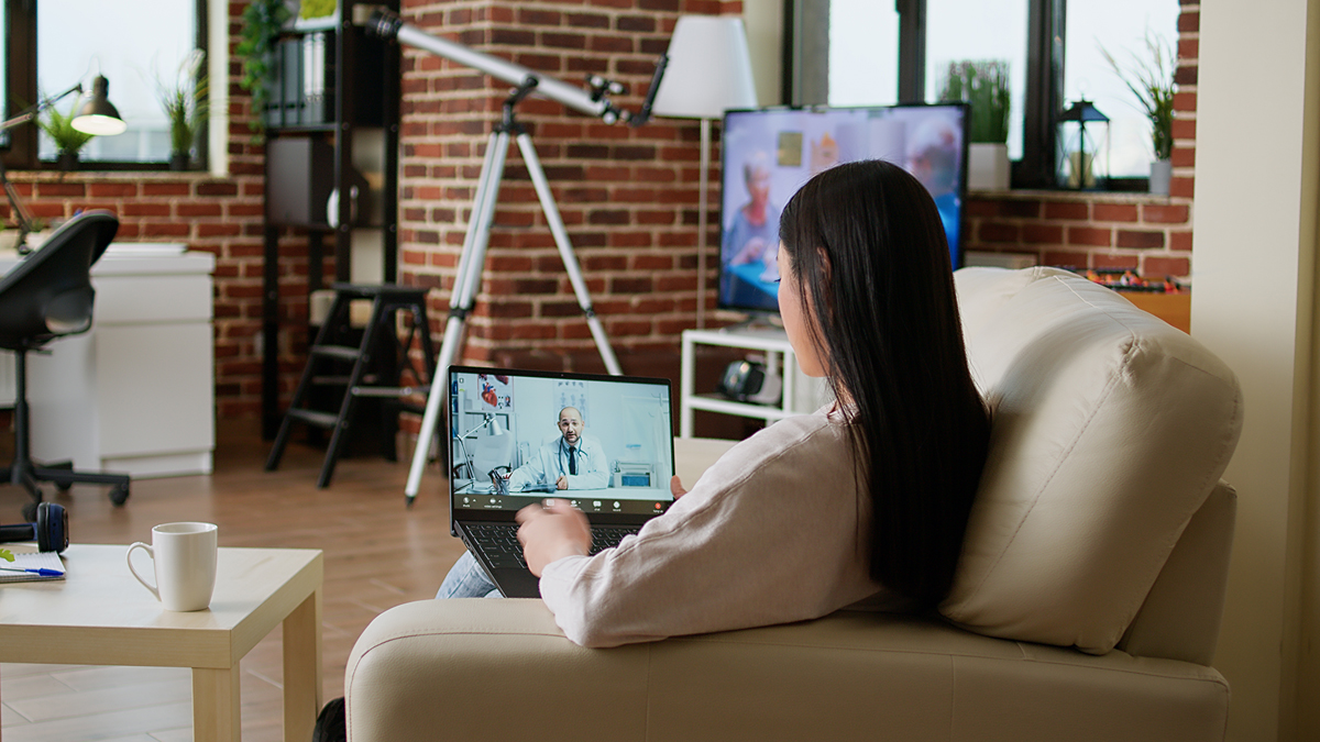 Woman on video call with doctor