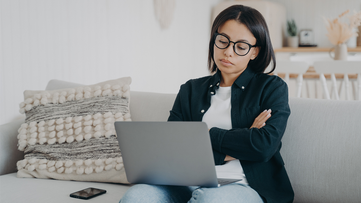 Woman tired on waiting for slow computer