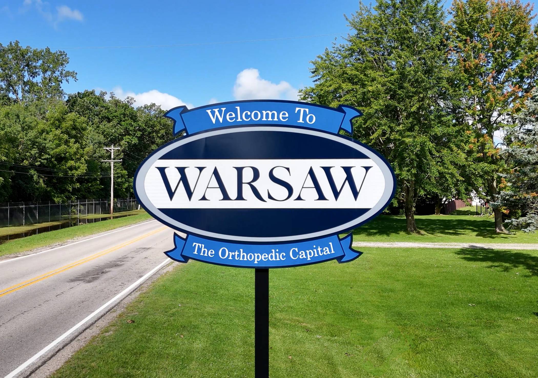 A sign that reads: Welcome to Warsaw - The Orthopedic Capital